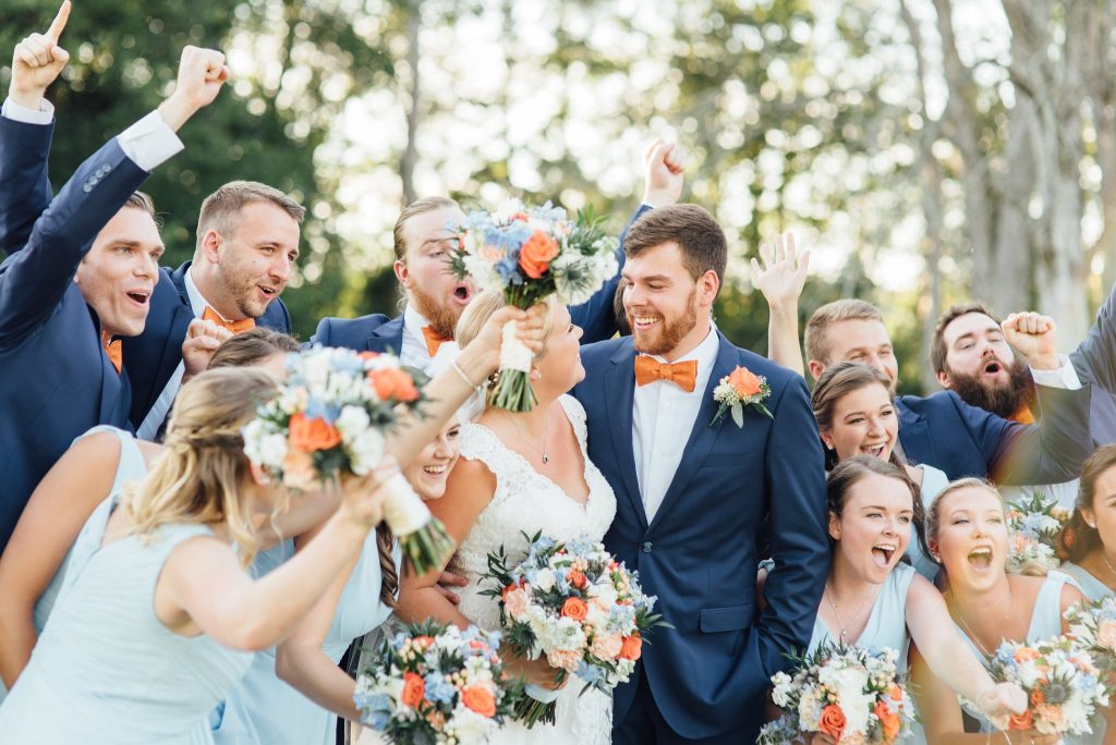 Cheering wedding guests